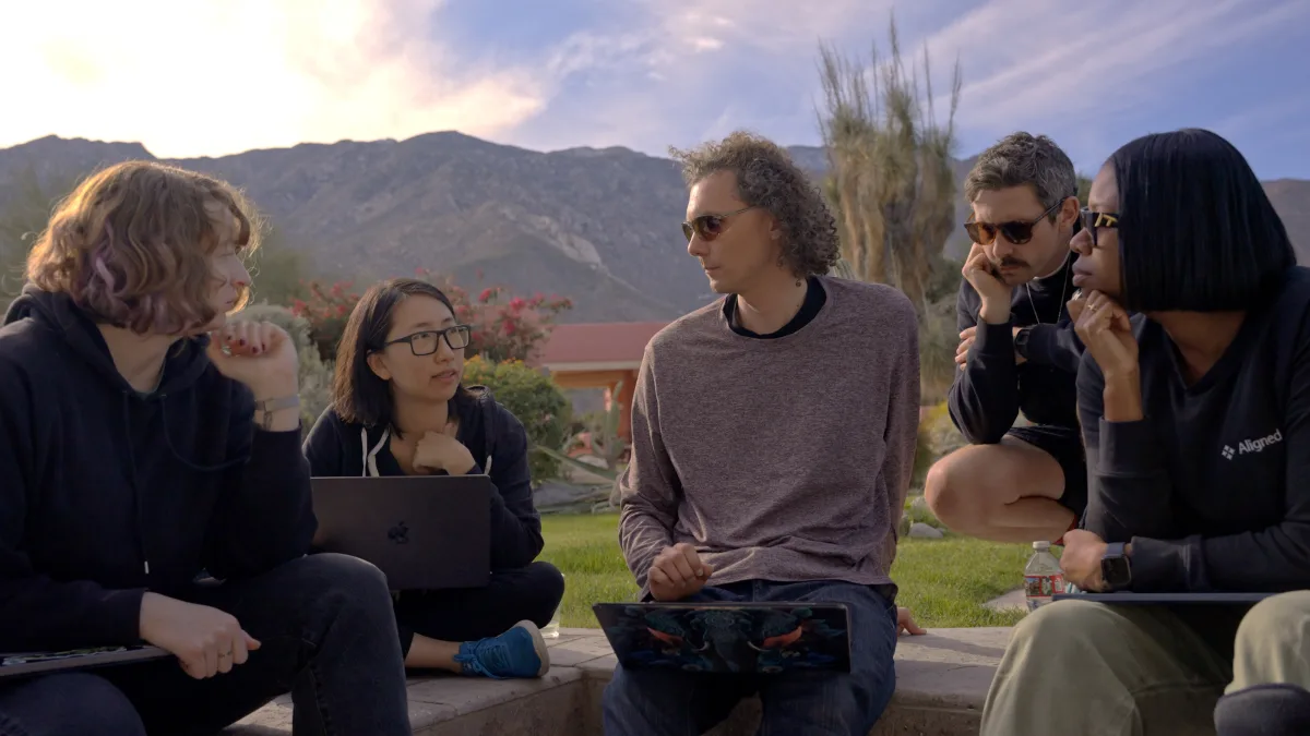 The Aligned team meeting outdoors
